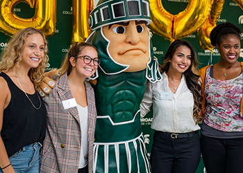 Business students with sparty